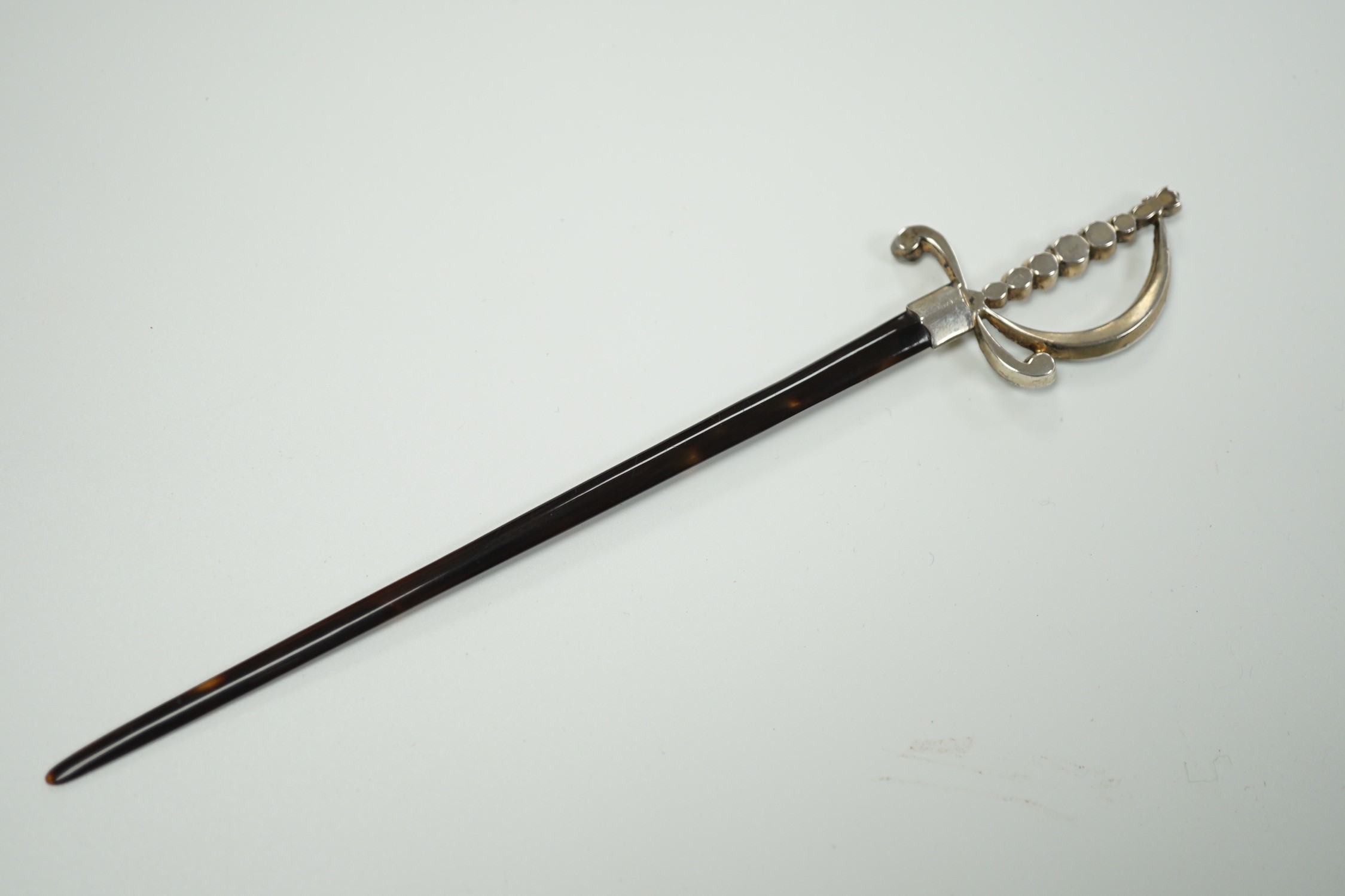 An early 20th century white metal and paste mounted tortoiseshell model of a court sword, 17.7cm, in fitted case.